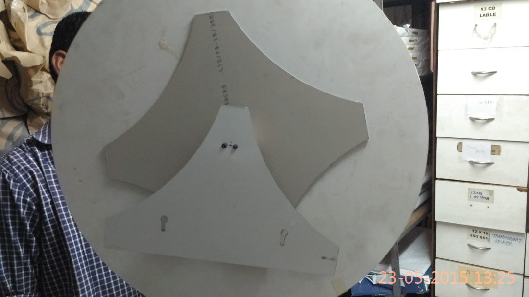 back view of the wheel of fortune showing how the wheel rotates on a spindle