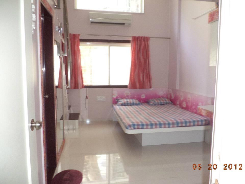 Furniture printing of personalised designs and colors on the head board of a bed is a great interior decoration idea