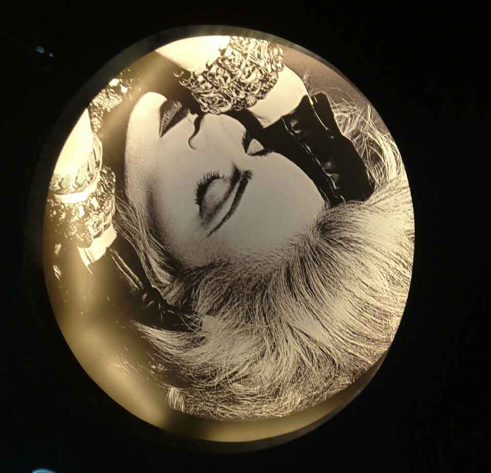 Madonna pop singer close up high lighted from the edges using concealed lights