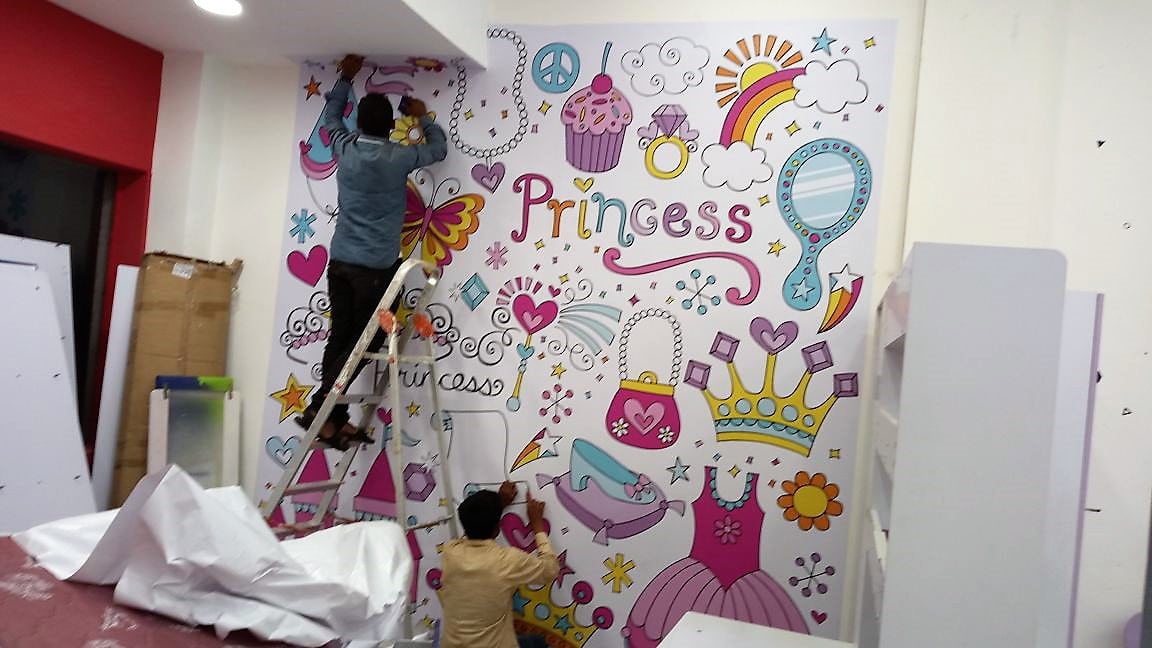 custom-designed-wallper-being-pasted-on-the-wall[1]