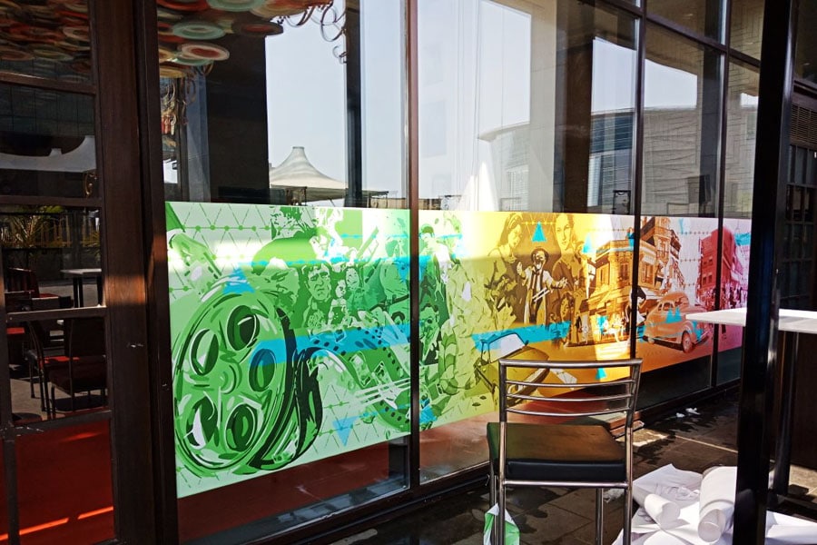 Inkjet printed opaque film pasted on a glass facade of a cafe to enhance the decor of the restaurant