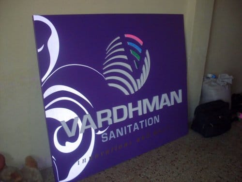 shop board made of night reflective vinyl where certain areas of the sign reflect light with a high intensity